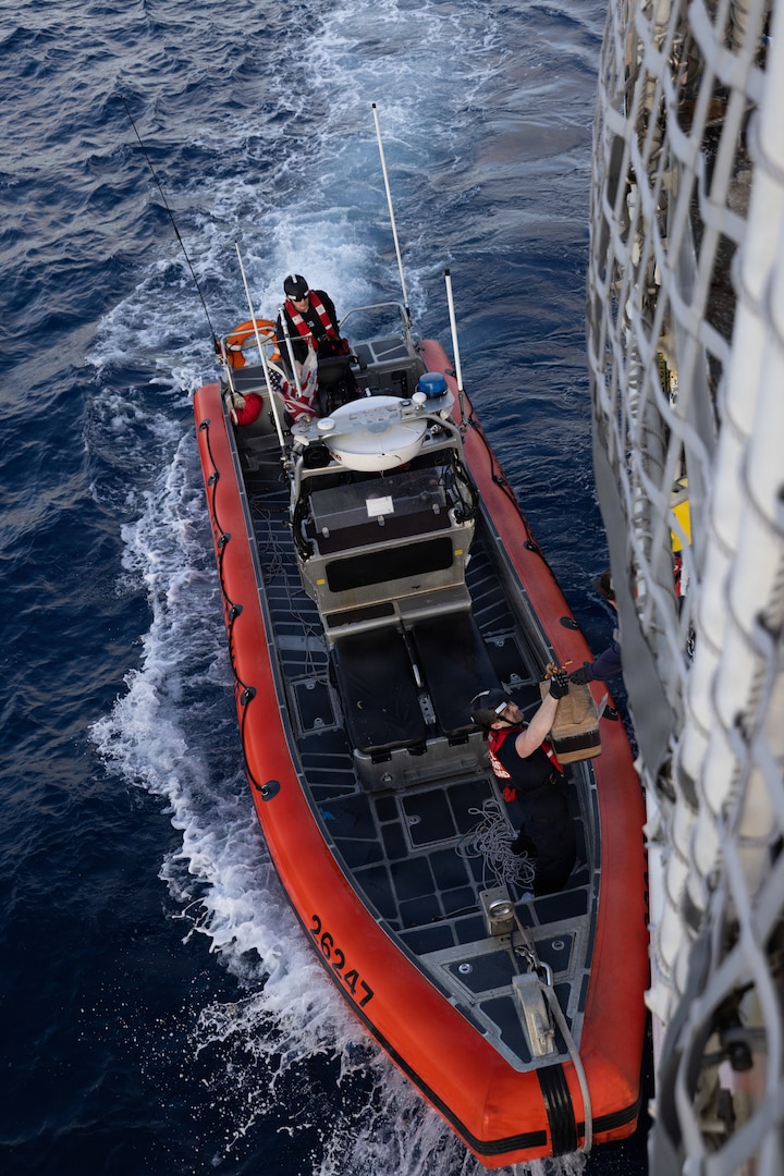 A Coast Guard Cutter Seneca's law enforcement crew transfers narcotic bales to the ship following an interdiction in the Eastern Pacific Ocean, Jan. 15, 2026. At the end of the patrol, Seneca's crew offloaded approximately 17,750 pounds of cocaine at Port Everglades, Florida. (U.S. Coast Guard photo by Coast Guard Seneca's crew)