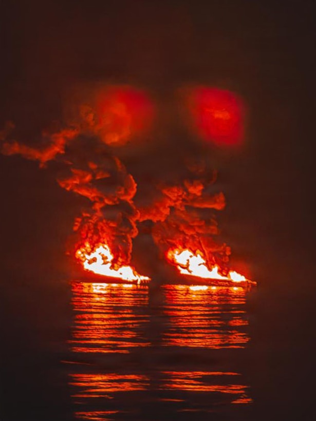 Two suspected drug smuggling vessels burn following an interdiction by Coast Guard Cutter Seneca's crew and their embarked helicopter air crew in the Eastern Pacific Ocean, Jan. 31, 2026. Following the patrol, Seneca's crew offloaded approximately 17, 750 pounds of cocaine at Port Everglades, Florida. (U.S. Coast Guard photo by Coast Guard Cutter Seneca's crew)