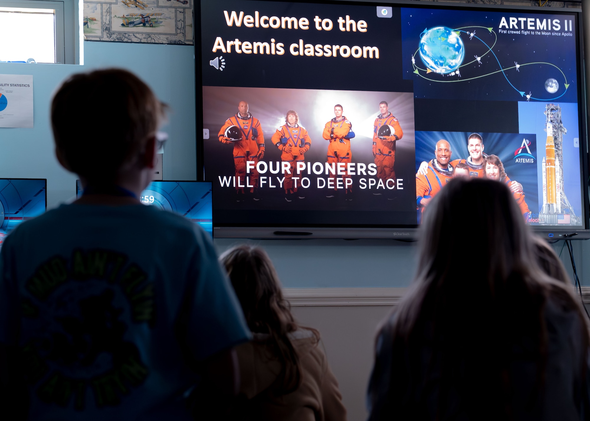 Students watch a video on the Artemis II mission overview at Maxwell Air Force Base, Alabama, Feb. 12, 2026.