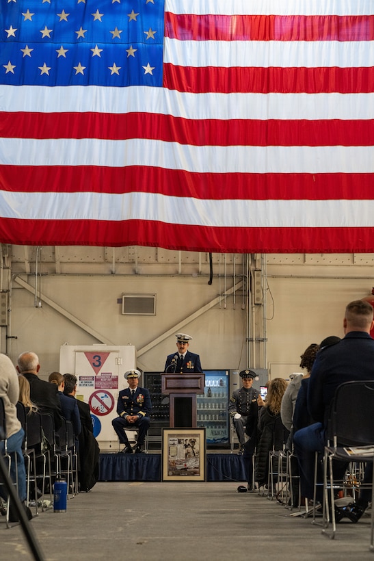 Lt. Jakob Daubert, commanding officer of Coast Guard Cutter Frederick Mann (WPC 1160), delivers a speech to assume command of the Mann during the cutter's commissioning ceremony at Base Kodiak, Alaska, Feb. 13, 2026. The commissioning solidified the Mann as the sixth fast response cutter to be homeported in Alaska to support missions in search and rescue, living marine resources, and maritime law enforcement. (U.S. Coast Guard photo by Petty Officer 3rd Class Cameron Snell)