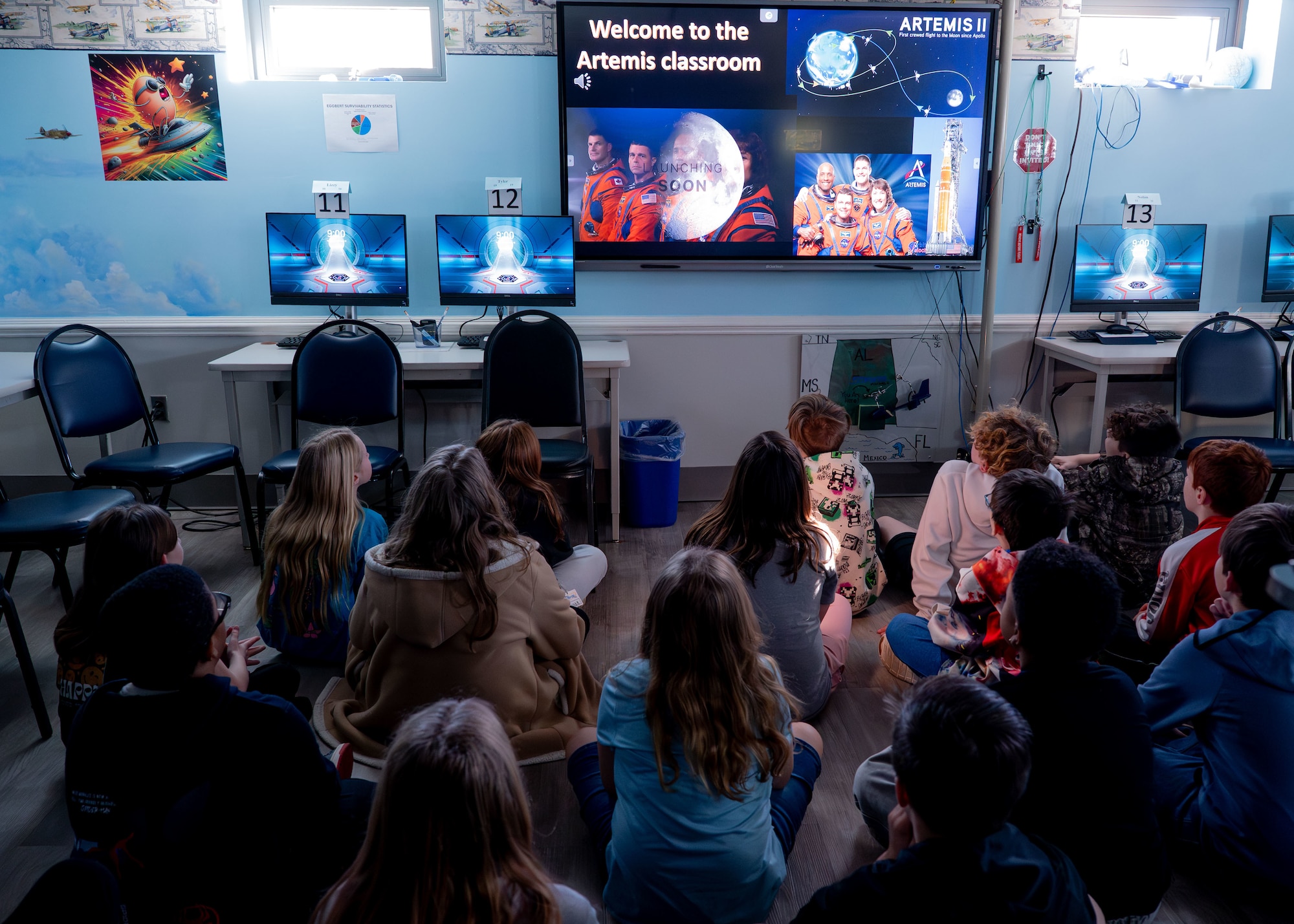 Students watch a video on the Artemis II mission overview at Maxwell Air Force Base, Alabama, Feb. 12, 2026.