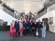 Air and Space Force senior leaders pose for a photo with members of the Arlington Committee during an appreciation luncheon, at Joint Base Anacostia-Bolling, Washington, D.C., Feb. 10, 2026.
