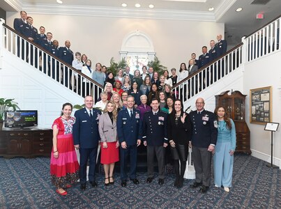 Air and Space Force senior leaders pose for a photo with members of the Arlington Committee during an appreciation luncheon, at Joint Base Anacostia-Bolling, Washington, D.C., Feb. 10, 2026.