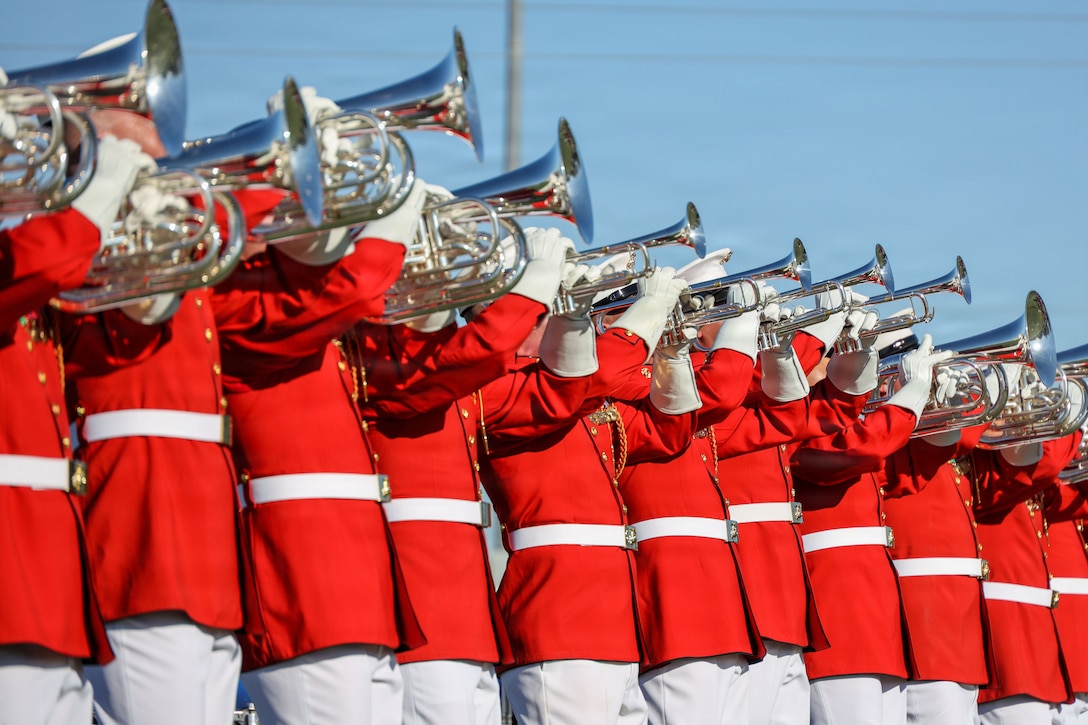 U.S. Marines with "The Commandant's Own" United States Marine Drum & Bugle Corps rehearse music during a dress rehearsal for upcoming performances in Australia and New Zealand at Marine Corps Air Station Yuma, Arizona, on Jan. 23, 2026. During the tour, the Drum & Bugle Corps will be traveling to Brisbane, Australia and Auckland, New Zealand in support of the Royal Edinburgh Military Tattoo. This training at Marine Corps Air Station Yuma supports “The Commandant’s Own” as they prepare for the 2026 Parade Season and ceremonial events marking America’s 250th anniversary. (U.S. Marine Corps photo by Cpl. Christopher Prelle)
