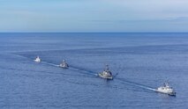 From left, Philippine Coast Guard Teresa Magbanua-class patrol vessel BRP Teresa Magbanua (MRRV 9701), Royal Australian Navy Anzac-class frigate HMAS Toowoomba (FFH 156), U.S. Navy Arleigh Burke-class guided-missile destroyer USS Dewey (DDG 105) and Philippine Navy Jose Miguel Malvar-class guided-missile frigate BRP Diego Silang (FFG 07) sail in formation during the Maritime Cooperative Activity (MCA) in the Philippines' Exclusive Economic Zone, Feb. 16, 2026. The U.S. Navy routinely operates with the Armed Forces of the Philippines and partners and allies through MCAs to continually develop, exercise and enhance multi-domain tactical interoperability to uphold peace and security in the region. Dewey is forward-deployed and assigned to Destroyer Squadron (DESRON) 15, the Navy’s largest DESRON and the U.S. 7th Fleet’s principal surface force. (U.S. Navy photo by Mass Communication Specialist 2nd Class Oscar Diaz)
