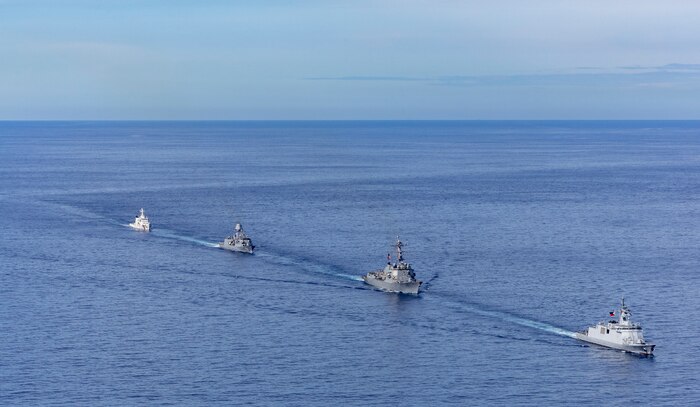 From left, Philippine Coast Guard Teresa Magbanua-class patrol vessel BRP Teresa Magbanua (MRRV 9701), Royal Australian Navy Anzac-class frigate HMAS Toowoomba (FFH 156), U.S. Navy Arleigh Burke-class guided-missile destroyer USS Dewey (DDG 105) and Philippine Navy Jose Miguel Malvar-class guided-missile frigate BRP Diego Silang (FFG 07) sail in formation during the Maritime Cooperative Activity (MCA) in the Philippines' Exclusive Economic Zone, Feb. 16, 2026. The U.S. Navy routinely operates with the Armed Forces of the Philippines and partners and allies through MCAs to continually develop, exercise and enhance multi-domain tactical interoperability to uphold peace and security in the region. Dewey is forward-deployed and assigned to Destroyer Squadron (DESRON) 15, the Navy’s largest DESRON and the U.S. 7th Fleet’s principal surface force. (U.S. Navy photo by Mass Communication Specialist 2nd Class Oscar Diaz)