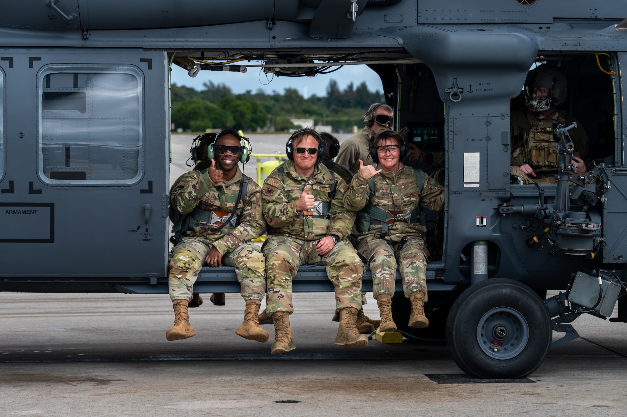 Chief Master Sgt. Katie McCool, Pacific Air Forces command chief, takes a helicopter tour of the 18th Wing