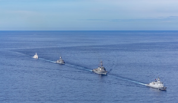 From left, Philippine Coast Guard Teresa Magbanua-class patrol vessel BRP Teresa Magbanua (MRRV 9701), Royal Australian Navy Anzac-class frigate HMAS Toowoomba (FFH 156), U.S. Navy Arleigh Burke-class guided-missile destroyer USS Dewey (DDG 105) and Philippine Navy Jose Miguel Malvar-class guided-missile frigate BRP Diego Silang (FFG 07) sail in formation during the Maritime Cooperative Activity (MCA) in the Philippines' Exclusive Economic Zone, Feb. 16, 2026. The U.S. Navy routinely operates with the Armed Forces of the Philippines and partners and allies through MCAs to continually develop, exercise and enhance multi-domain tactical interoperability to uphold peace and security in the region. Dewey is forward-deployed and assigned to Destroyer Squadron (DESRON) 15, the Navy’s largest DESRON and the U.S. 7th Fleet’s principal surface force. (U.S. Navy photo by Mass Communication Specialist 2nd Class Oscar Diaz)