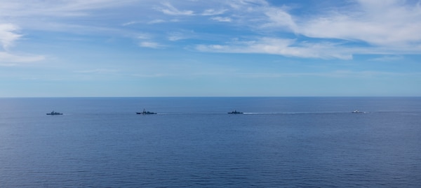 From left, Philippine Navy Jose Miguel Malvar-class guided-missile frigate BRP Diego Silang (FFG 07), U.S. Navy Arleigh Burke-class guided-missile destroyer USS Dewey (DDG 105), Royal Australian Navy Anzac-class frigate HMAS Toowoomba (FFH 156) and Philippine Coast Guard Teresa Magbanua-class patrol vessel BRP Teresa Magbanua (MRRV 9701) steam in formation during the Maritime Cooperative Activity (MCA) in the Philippines' Exclusive Economic Zone, Feb. 16, 2026. The U.S. Navy routinely operates with the Armed Forces of the Philippines and partners and allies through MCAs to continually develop, exercise and enhance multi-domain tactical interoperability to uphold peace and security in the region. Dewey is forward-deployed and assigned to Destroyer Squadron (DESRON) 15, the Navy’s largest DESRON and the U.S. 7th Fleet’s principal surface force. (U.S. Navy photo by Mass Communication Specialist 2nd Class Oscar Diaz)