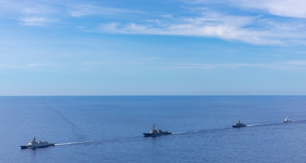 From left, Philippine Navy Jose Miguel Malvar-class guided-missile frigate BRP Diego Silang (FFG 07), U.S. Navy Arleigh Burke-class guided-missile destroyer USS Dewey (DDG 105), Royal Australian Navy Anzac-class frigate HMAS Toowoomba (FFH 156) and Philippine Coast Guard Teresa Magbanua-class patrol vessel BRP Teresa Magbanua (MRRV 9701) sail in formation during the Maritime Cooperative Activity (MCA) in the Philippines' Exclusive Economic Zone, Feb. 16, 2026. The U.S. Navy routinely operates with the Armed Forces of the Philippines and partners and allies through MCAs to continually develop, exercise and enhance multi-domain tactical interoperability to uphold peace and security in the region. Dewey is forward-deployed and assigned to Destroyer Squadron (DESRON) 15, the Navy’s largest DESRON and the U.S. 7th Fleet’s principal surface force. (U.S. Navy photo by Mass Communication Specialist 2nd Class Oscar Diaz)