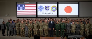 A group of people pose for a picture.