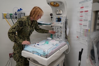 260103-N-FT324-6357. ROTA, Spain (Jan. 3, 2026) -- Lt. Mackenna Smith, a native of Los Angeles, assigned to Navy Medicine Readiness and Training Command Rota, conducts daily operational checks on a Panda Warmer used for neonatal resuscitation events at Naval Hospital Rota. Smith, a registered nurse in the Multi-Service Ward Department, ensures critical medical equipment is properly functioning and ready to provide immediate care for newborn patients requiring emergency medical support. (U.S. Navy photo by Lieutenant Commander Alicia Sacks)