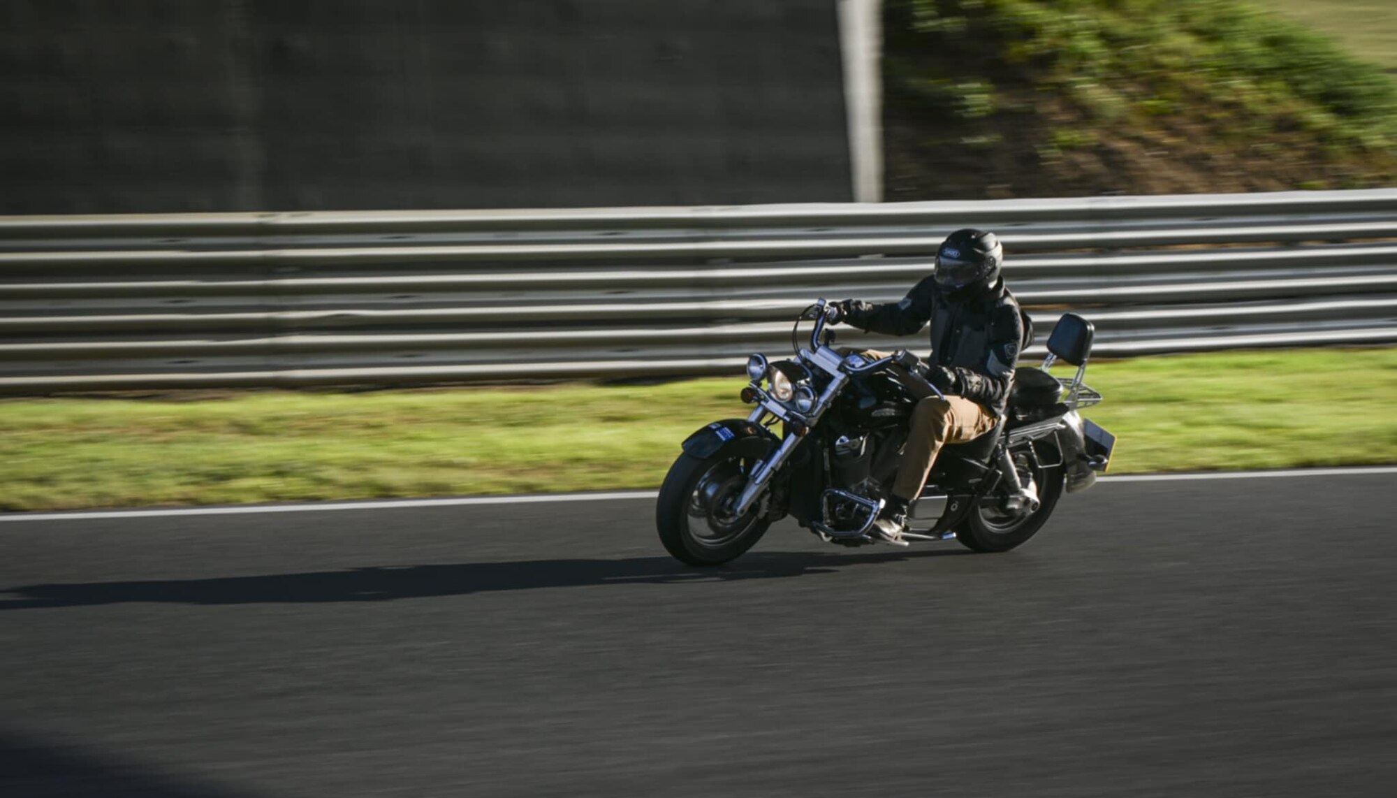 U.S. Air Force Staff Sgt. Wade Carpenter, 100th Maintenance Squadron KC-135 aircraft maintenance repair crew chief, decelerates into a sharp corner at Snetterton Race Circuit, Norwich, England, August 18, 2025.