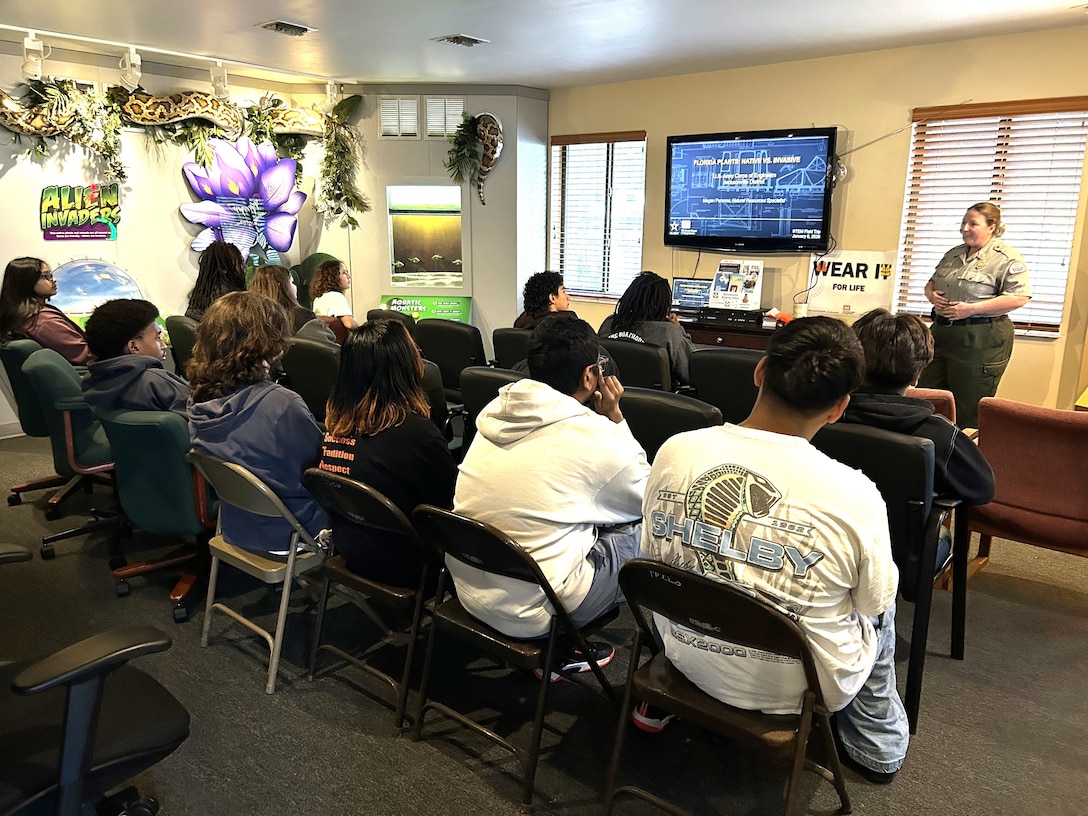 Megan Parson, Acting Lead Park Ranger, leads students through an interactive lesson on Florida’s native and invasive plant species. As part of a STEM outreach event with Dunbar High School, students explored how biology and environmental sciences are applied into a park ranger’s daily routine and learned about potential STEM-focused career paths. (USACE photo by Brian Holtzinger, Natural Resources Program Manager)