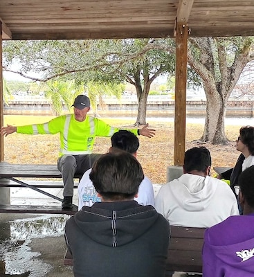 Safety first! Before the tour, Jason Pritt, Lock Operator, gave students a safety briefing and an overview of the WP Franklin Lock and Dam. As part of their STEM-focused field trip, students learned about career paths in science and engineering and gained insight into lock operations within the U.S. Army Corps of Engineers. (USACE photo by John Miracle, Volunteer and former Jacksonville District Lock Mechanic)