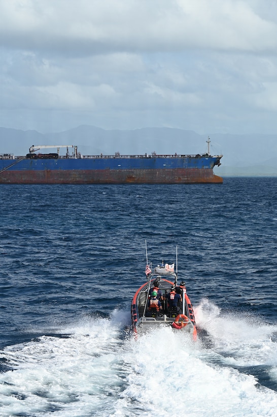 A Coast Guard Cutter Mohawk (WMEC 913) small boat crew operates near the anchored motor tanker Veronica in the Caribbean Sea, Jan. 18, 2026. Mohawk's crew retrieved a joint warfare team that had provided security and navigation assistance aboard Veronica following its interception and seizure by a Coast Guard tactical team with Department of War support; the retrieval marked the end of a 700-nautical-mile escort of the sanctioned vessel to a secure anchorage. (U.S. Coast Guard photo by Seaman Isabella Silvestri)
