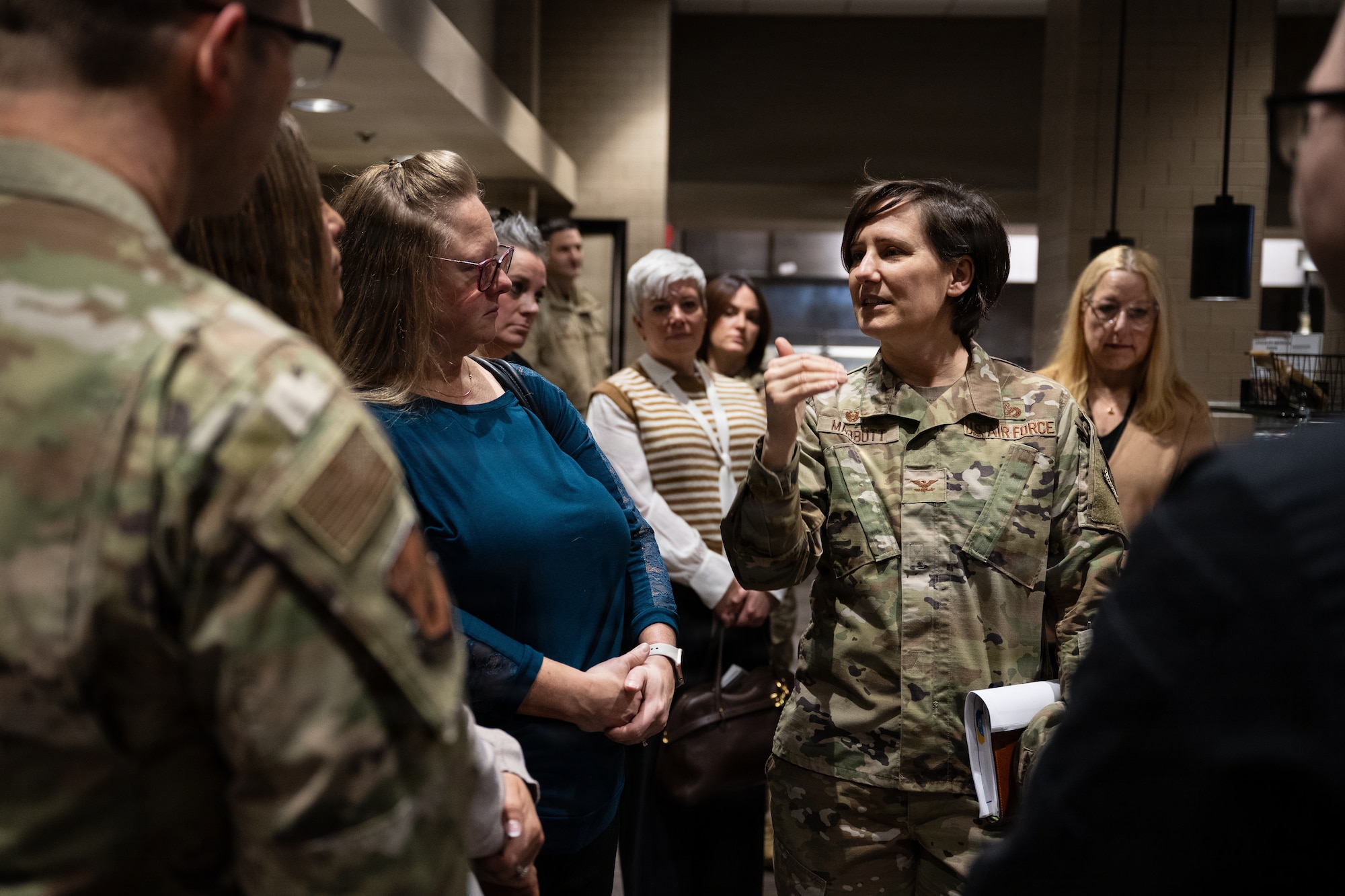 U.S. Air Force Col. Lisa Mabbutt, Joint Base Elmendorf-Richardson and 673d Air Base Wing, commander, speaks with Eleventh Air Force leadership and spouses about the Iditarod Dining Facility’s achievements and recent renovations at JBER, Alaska, Feb. 9, 2026. The dining facility is routinely recognized as a top food-service program in the Air Force, receiving 22 medals at the Military Culinary Arts Competition. (U.S. Air Force photo by Airman Keola Vischi)