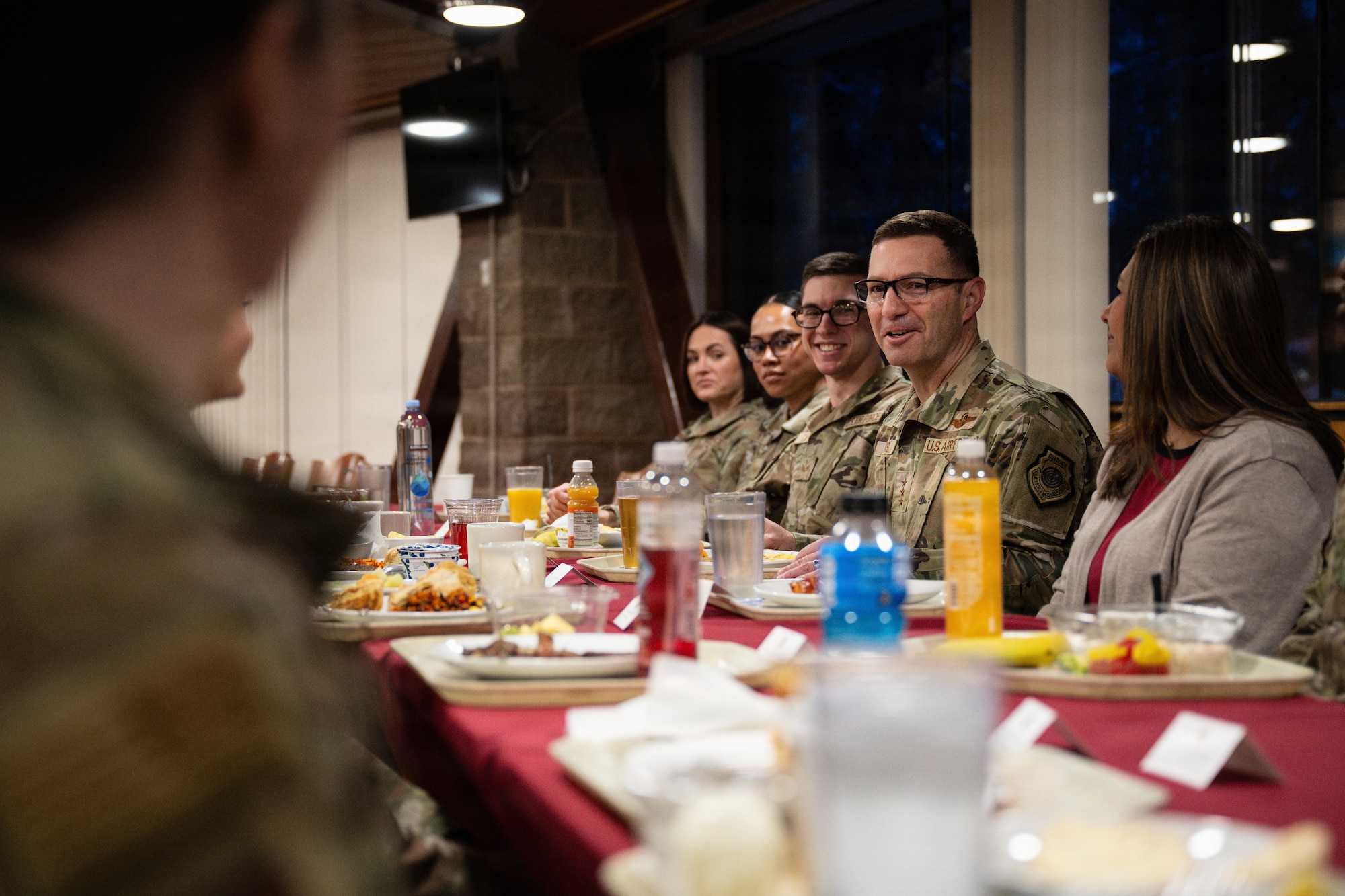 U.S. Air Force Lt. Gen. Robert Davis, Alaskan NORAD Region, Alaskan Command and Eleventh Air Force, commander, recounts his experience in the Air Force and offers advice to Airmen over breakfast at Joint Base Elmendorf-Richardson, Alaska, Feb. 9, 2026. Davis emphasized the importance of a healthy balance between family, work, finances and personal hobbies. The visit gave leaders and spouses an opportunity to learn more about installation resources as well as creating a stronger relationship between leaders and Airmen. (U.S. Air Force photo by Airman Keola Vischi)