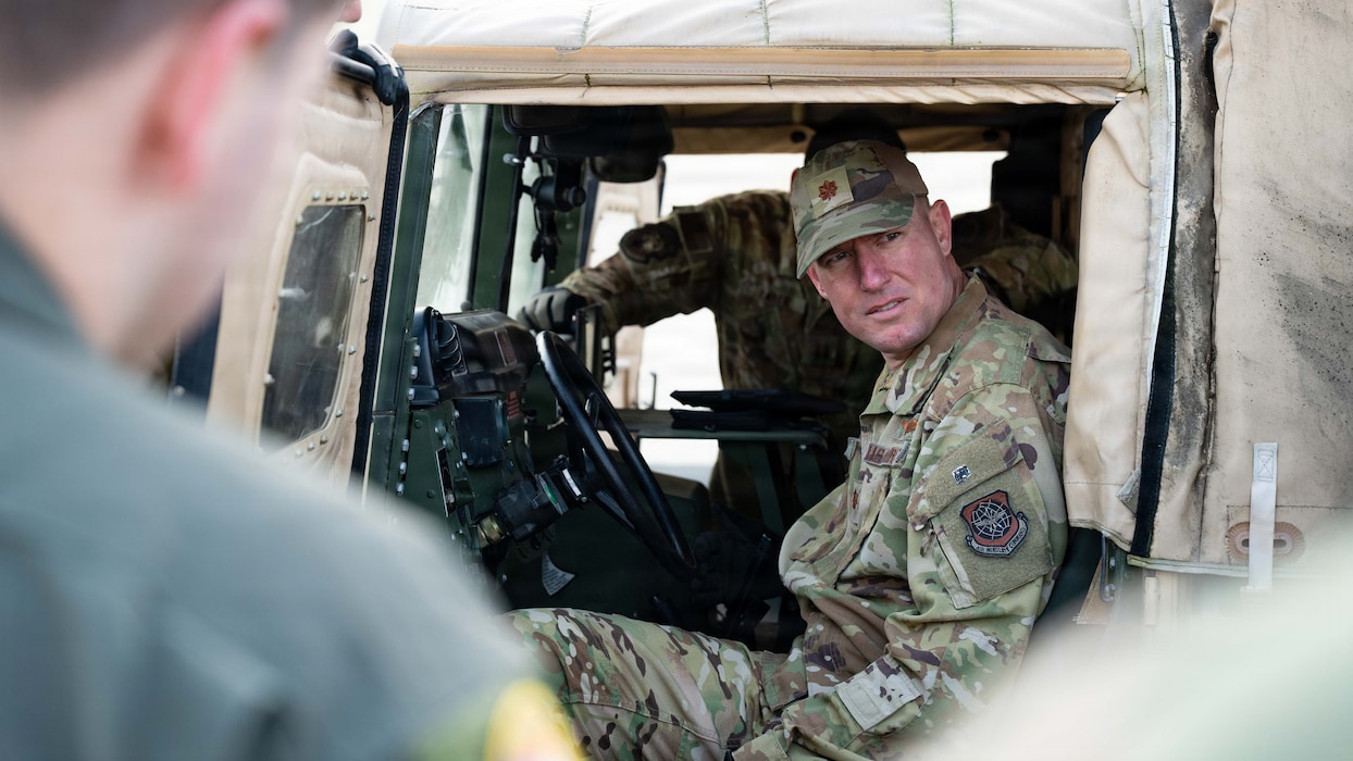 Airman inspects a Humvee
