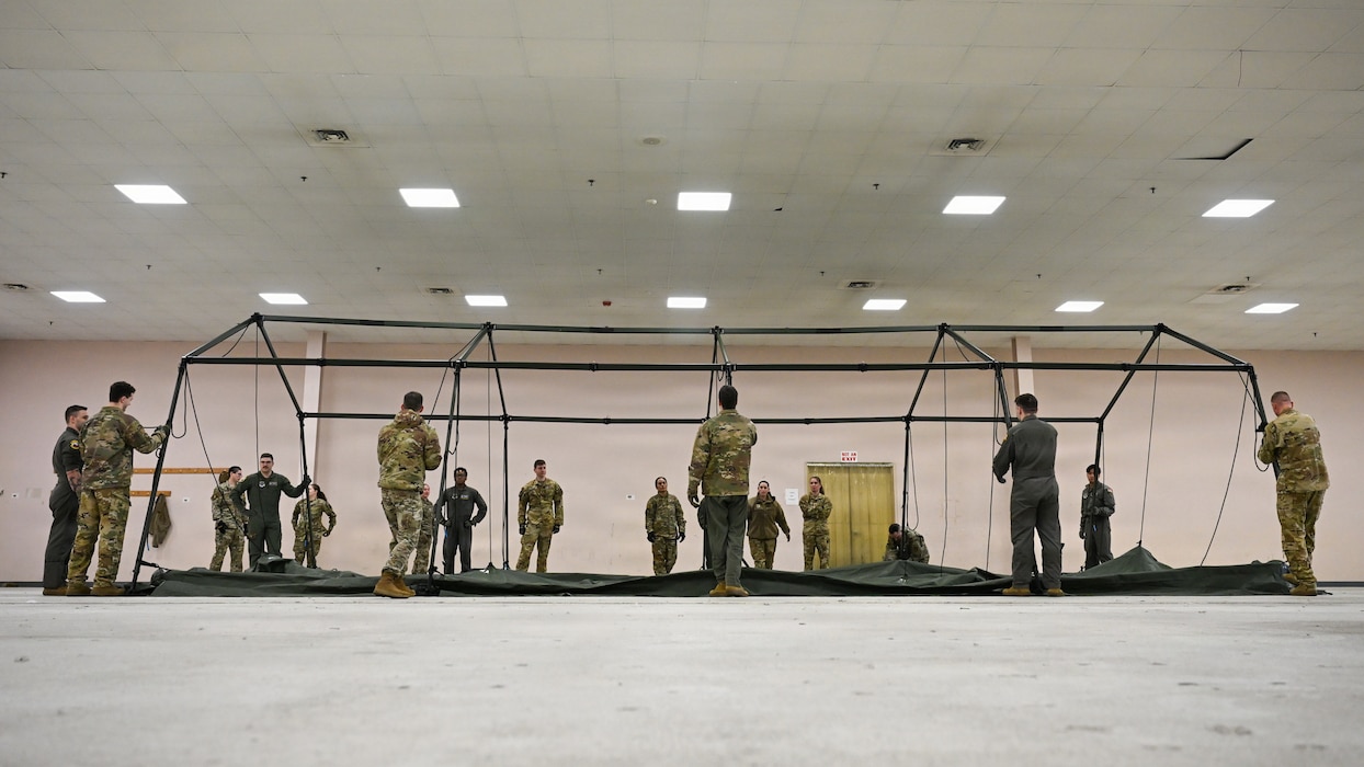 Airmen assemble field shelter