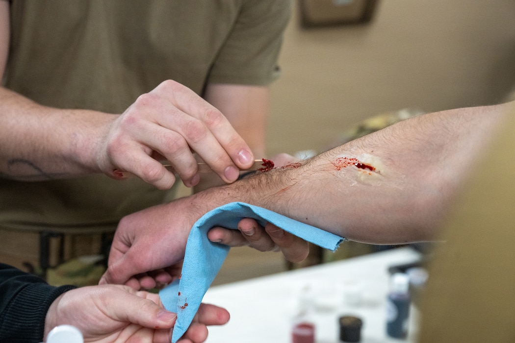 Airman applies moulage