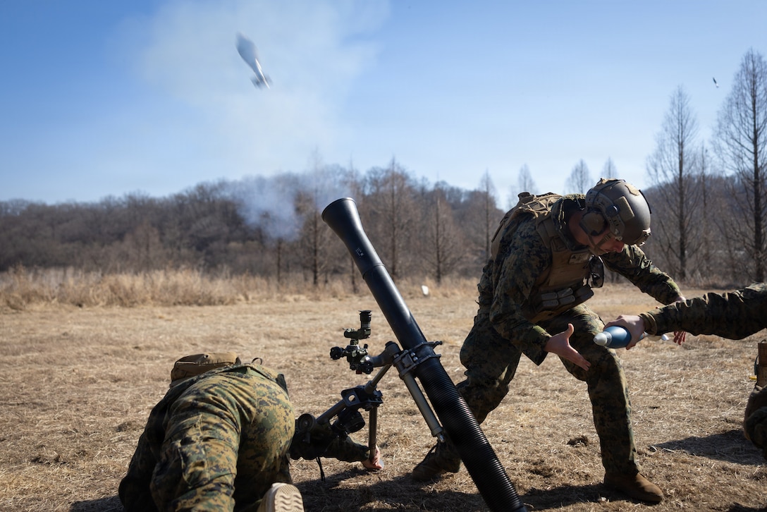 U.S. Marines with 2nd Battalion, 7th Marines, forward deployed with 4th Marine Regiment, 3d Marine Division as part of the Unit Deployment Program, fire an M252 81mm mortar during Korea Viper 26.2 at Camp Story, South Korea, Feb. 9, 2026.
