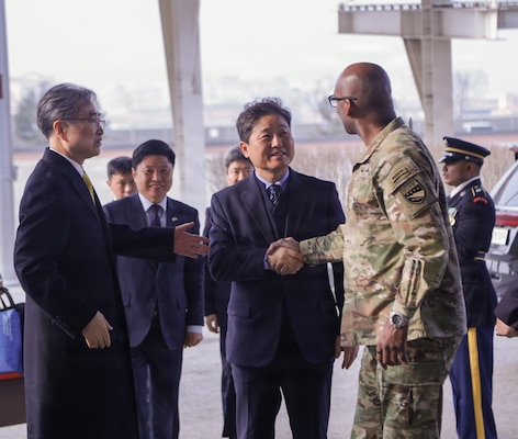 U.S. Army General Xavier Brunson shakes hands with Republic of Korea Foreign Minister Hon. Cho Hyun and other National Assembly members as they arrive to United Nations Command and U.S. Forces Korea headquarters at Camp Humphreys, Feb. 13, 2026.