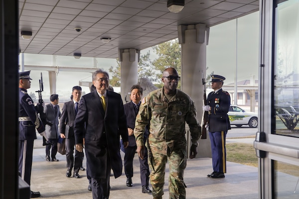 U.S. Army General Xavier Brunson walks with Republic of Korea Foreign Minister Hon. Cho Hyun and other National Assembly members as they arrive to United Nations Command and U.S. Forces Korea headquarters at Camp Humphreys, Feb. 13, 2026.