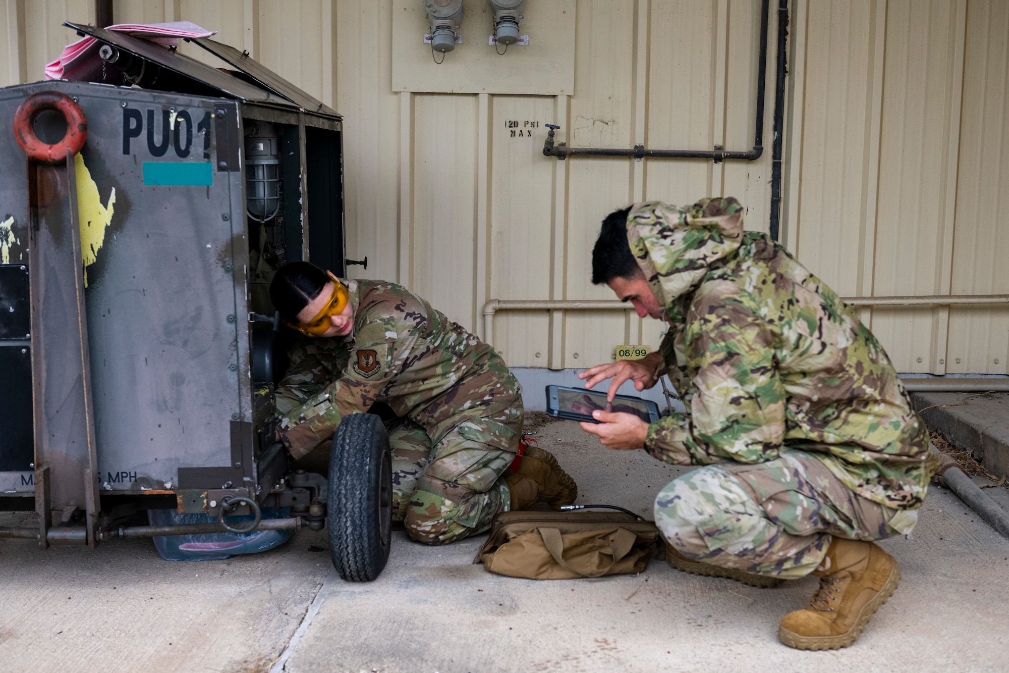 A U.S. Airman inspect an equipment
