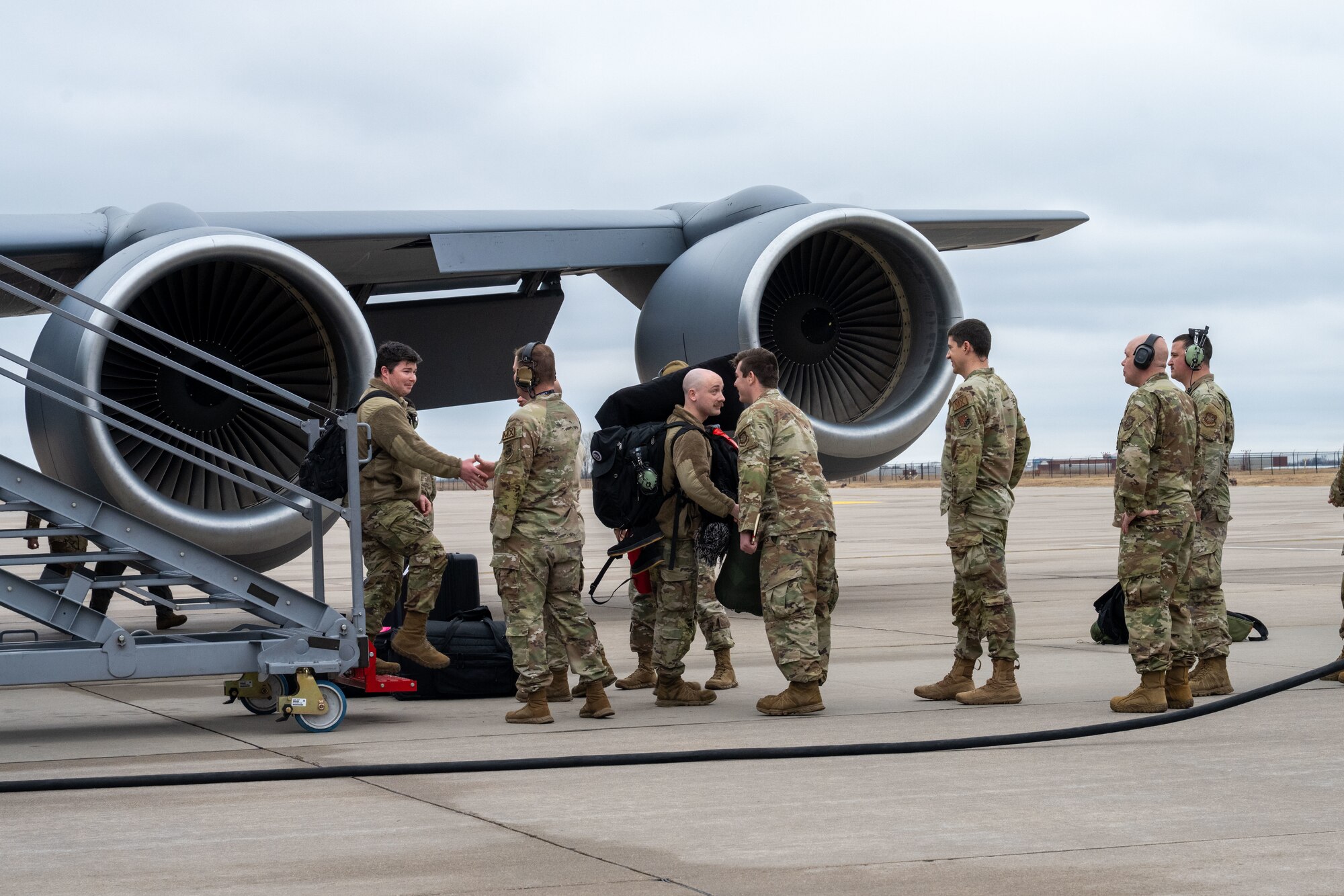 Airmen are welcomed home by family and friends at McConnell Air Force Base, Kansas, Feb. 14, 2026. Team members deployed in support of ongoing operations, providing global reach and rapid air refueling capabilities. (U.S. Air Force photo by Senior Airman Paula Arce)