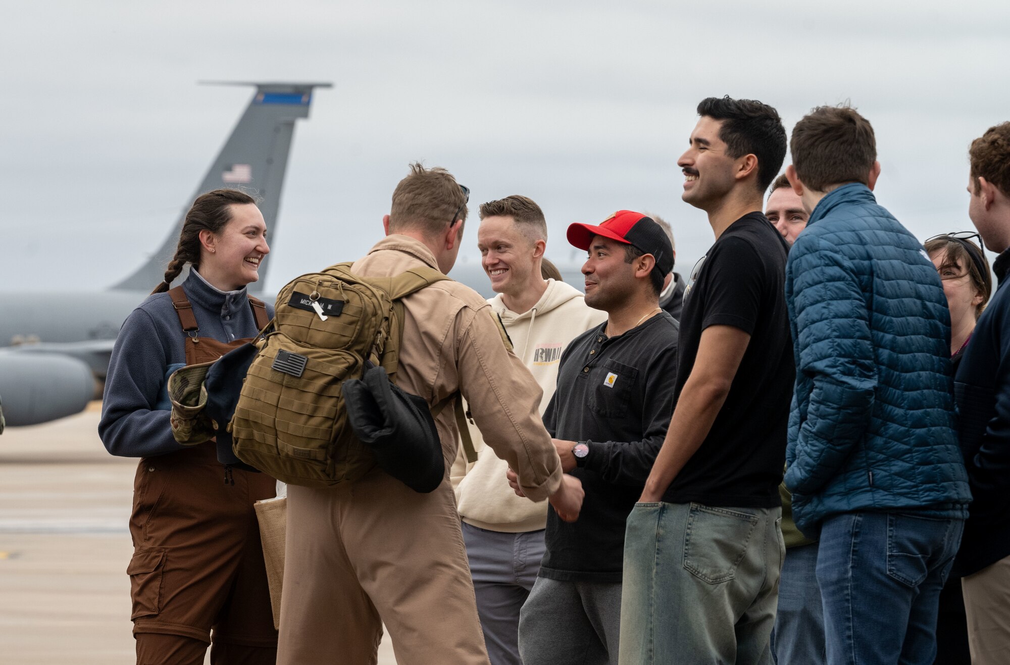 Airmen are welcomed home by family and friends at McConnell Air Force Base, Kansas, Feb. 14, 2026. Team members deployed in support of ongoing operations, providing global reach and rapid air refueling capabilities. (U.S. Air Force photo by Senior Airman Paula Arce)