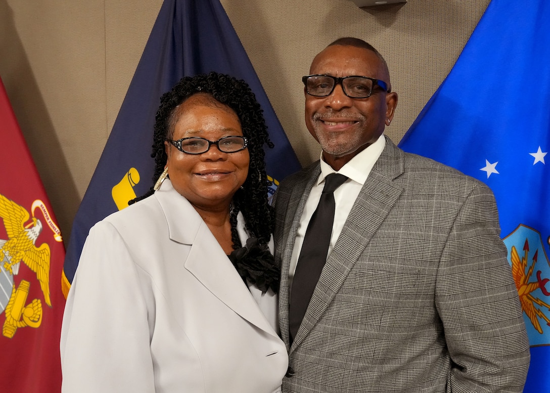 Cynthia Mitchell-Riley, joined by her husband Reginald, during her retirement ceremony from Troop Support in Philadelphia on Feb. 12. Photo by Ed Maldonado