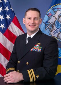 Lt. Cmdr. J. A. Tucker, Executive Officer, Cryptologic Warfare Activity (CWA) 66