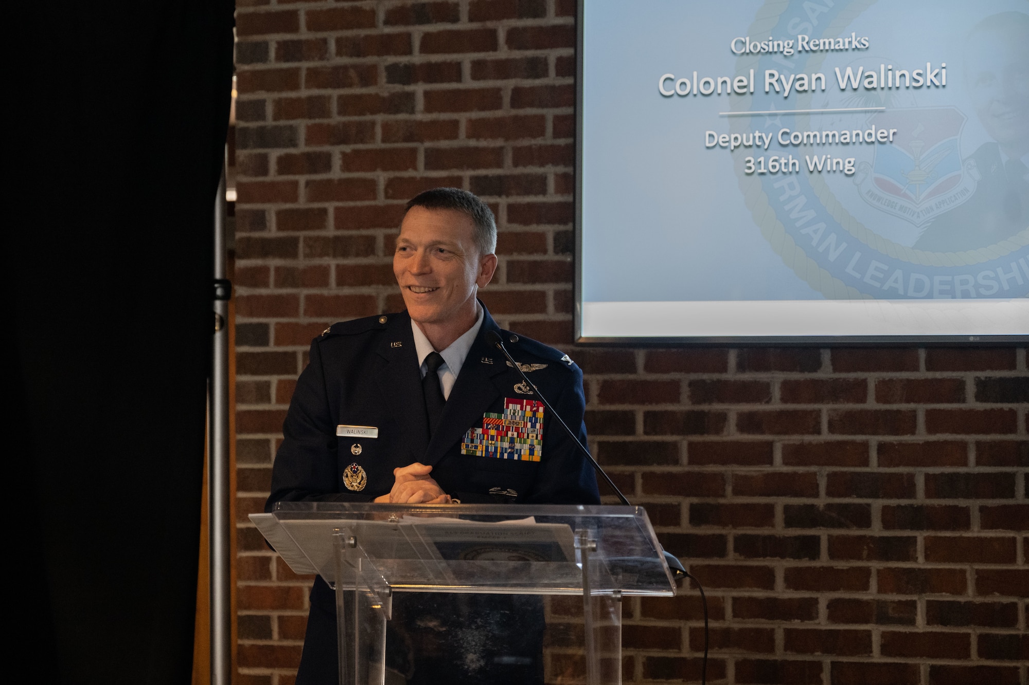 A man stands at a podium.