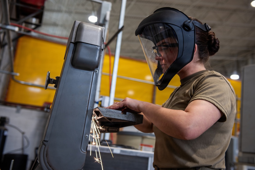 Airman uses grinder