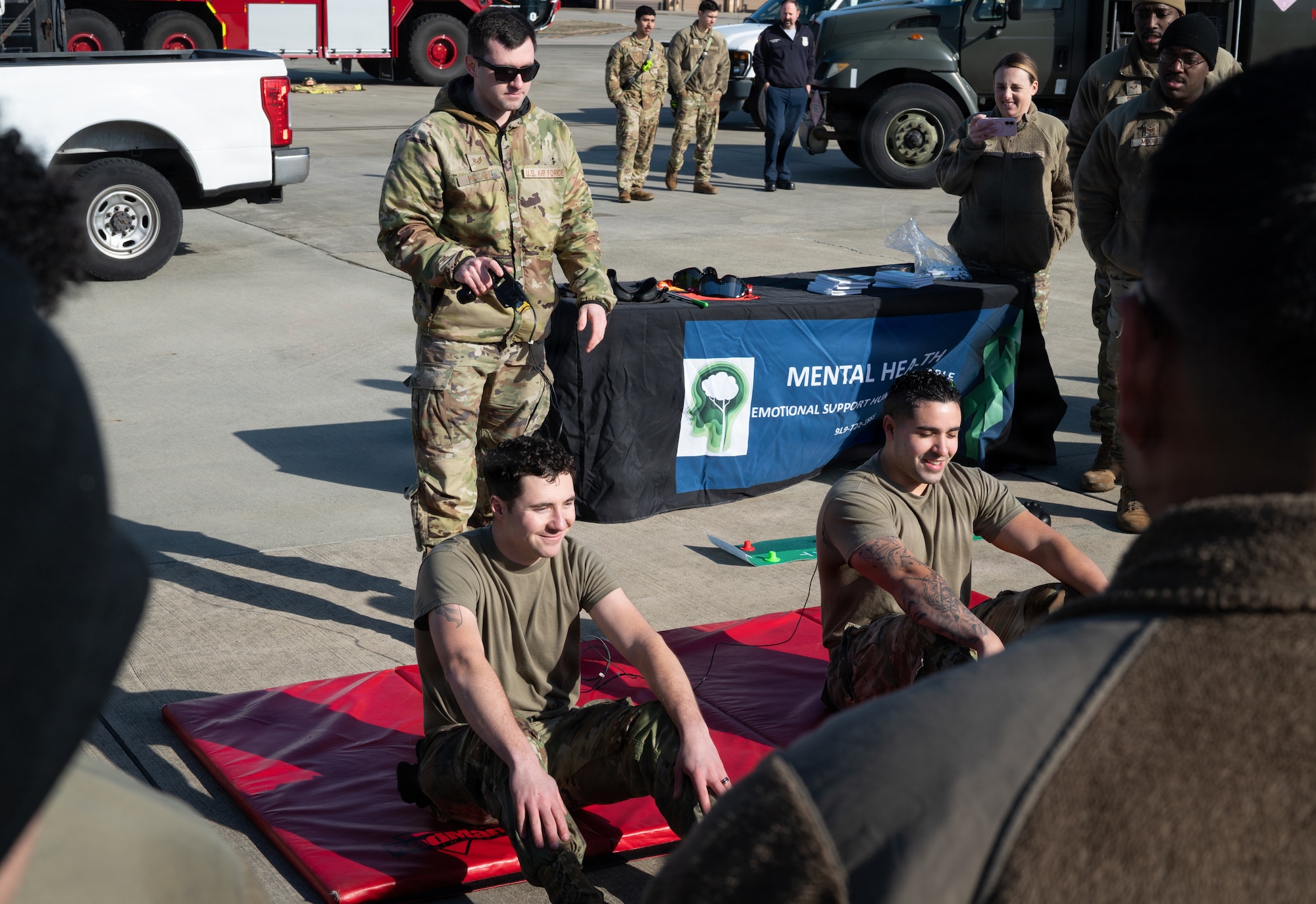 U.S. Air Force Airmen assigned to the 4th Fighter Wing participate in a electronic control device demonstration during a Airpower Generation Rally at Seymour Johnson Air Force Base, North Carolina, Feb. 6, 2026. Members of the 4th Security Forces Squadron conducted the demonstration to showcase the nonlethal effectiveness of a stun gun. (U.S. Air Force photo by Airman 1st Class Holly Leonard)