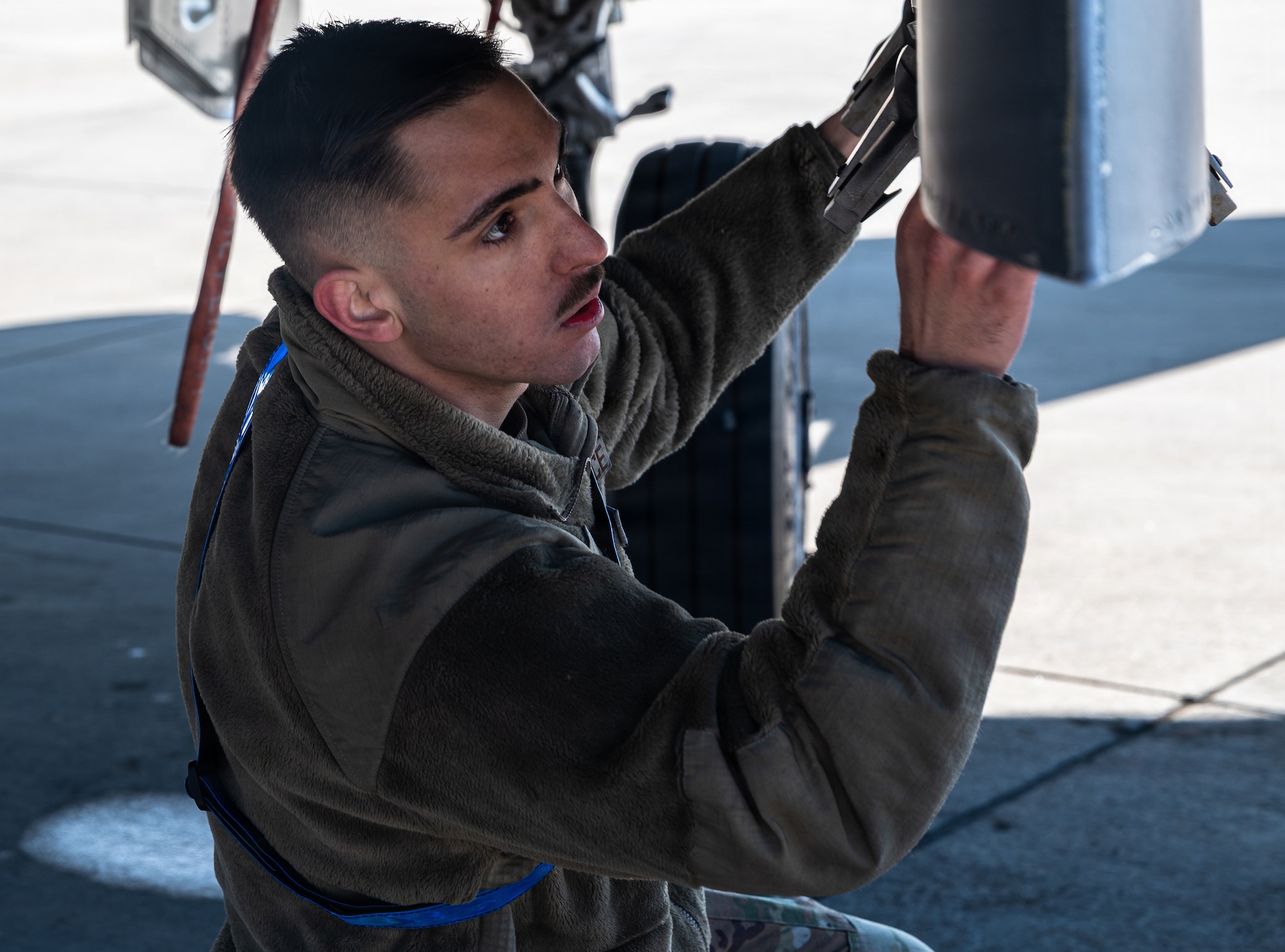U.S. Air Force Airman 1st Class Torres Mitchell, 334th Fighter Generation Squadron weapons load crew member, competes in a Airpower Generation Rally at Seymour Johnson Air Force Base, North Carolina, Feb. 6, 2026. The 334th FGS placed first by generating their aircraft the fastest while maintaining safety and quality standards. (U.S. Air Force photo by Airman 1st Class Holly Leonard)
