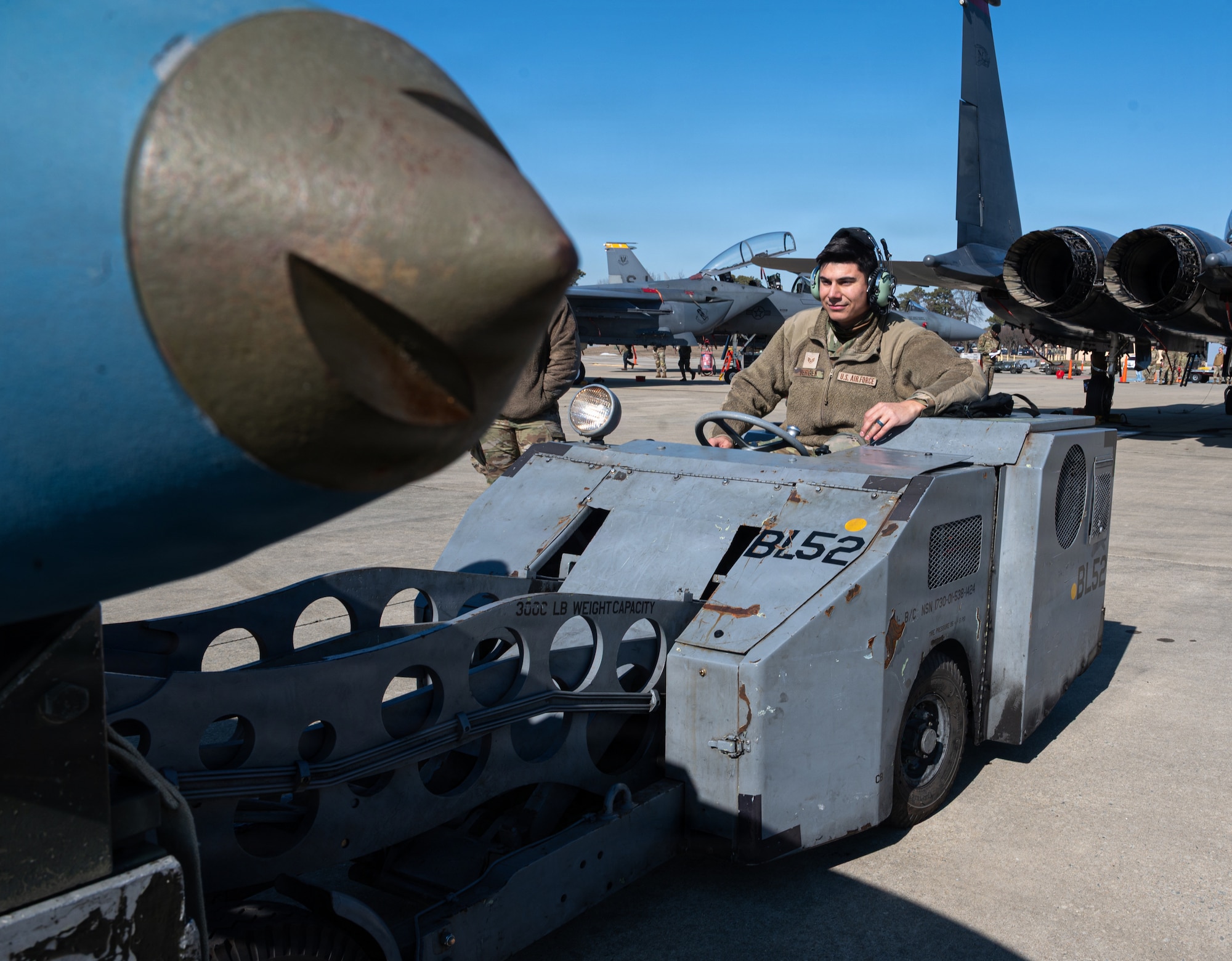 U.S. Air Force Staff Sgt. John Bergen, 414th Maintenance Squadron aircraft armament technician, participates in a Airpower Generation Rally at Seymour Johnson Air Force Base, Feb. 6, 2026. The event provided family members an opportunity to observe maintenance operations and understand the teamwork behind airpower generation. (U.S. Air Force photo by Airman 1st Class Holly Leonard)