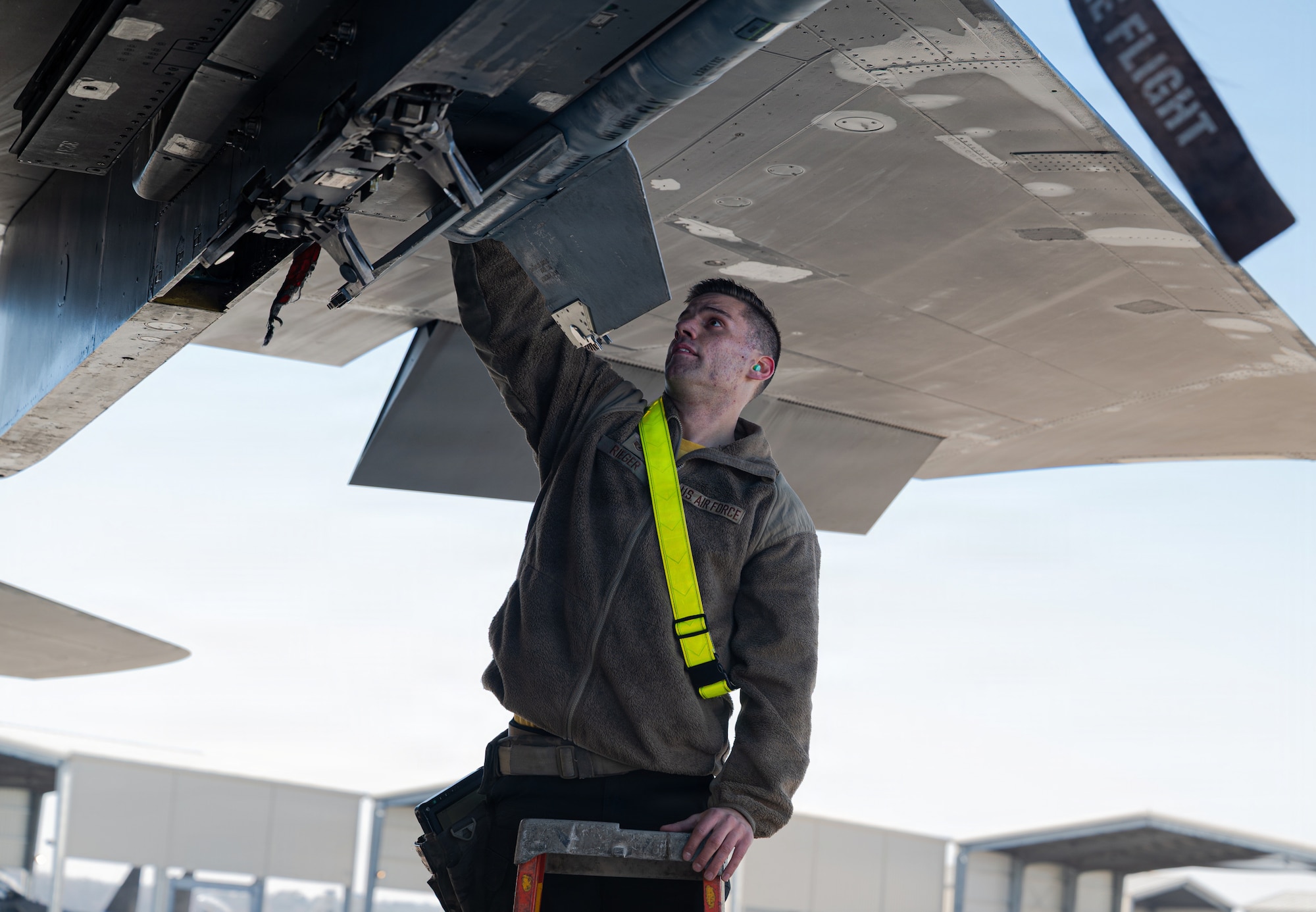 U.S. Air Force Staff Sgt. William Rieger, 336th Fighter Generation Squadron weapons load crew member, competes in a Airpower Generation Rally at Seymour Johnson Air Force Base, North Carolina, Feb. 6, 2026. he rally emphasized teamwork, technical proficiency, and attention to detail required to rapidly generate combat-ready aircraft. (U.S. Air Force photo by Airman 1st Class Holly Leonard)
