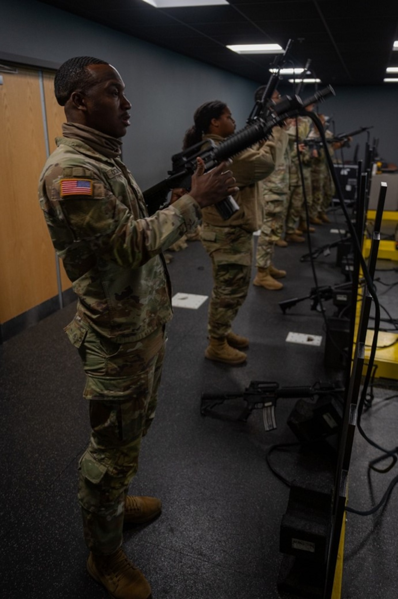 Soldiers reload M-4 replicas. (U.S. Air Force photo by Airman 1st Class Donnell Ramsey)