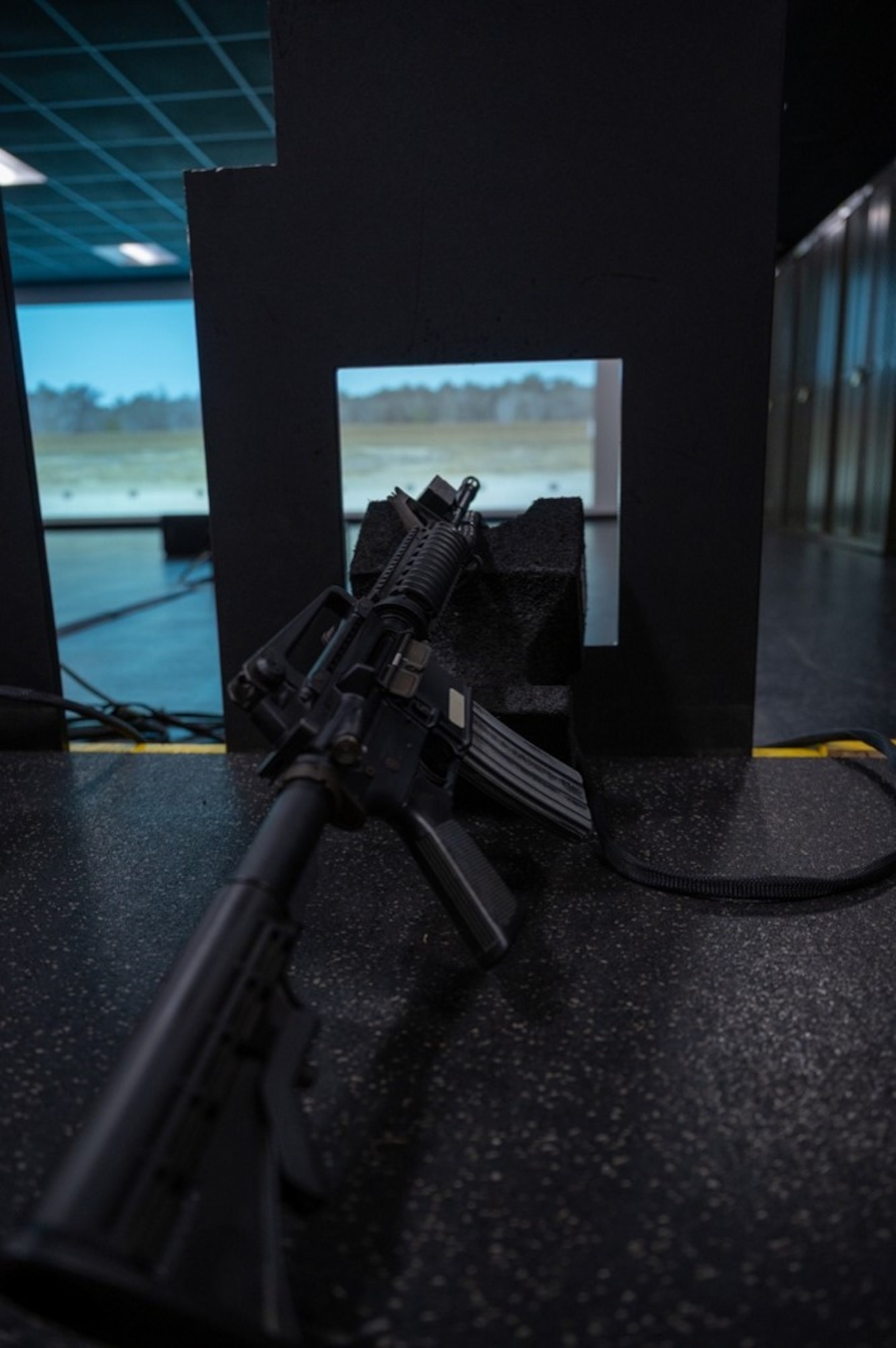 An M-4 replica lies pointed at a wall. (U.S. Air Force photo by Airman 1st Class Donnell Ramsey)