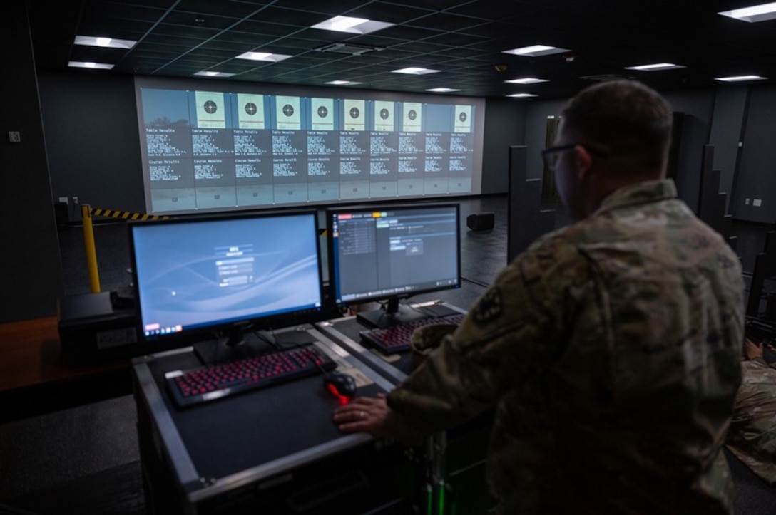 Soldier points and clicks with a mouse on a computer. (U.S. Air Force photo by Airman 1st Class Donnell Ramsey)