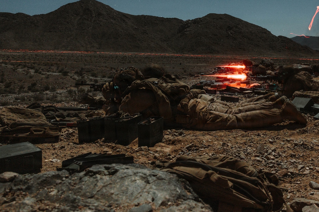 U.S. Marines with 3rd Battalion, 7th Marine Regiment, 1st Marine Division, provide suppressive fire during Company night attacks as part of Integrated Training Exercise 1-26 at Range 400, Marine Corps Air Ground Combat Center, Twentynine Palms, California, Jan. 29, 2026. Through realistic scenarios and decentralized decision-making, ITX provides Marines the venue to enhance their lethality by empowering leaders at every level to adapt, communicate, and execute in dynamic environments. (U.S. Marine Corps photo by Lance Cpl. Gracelyn Hanson)