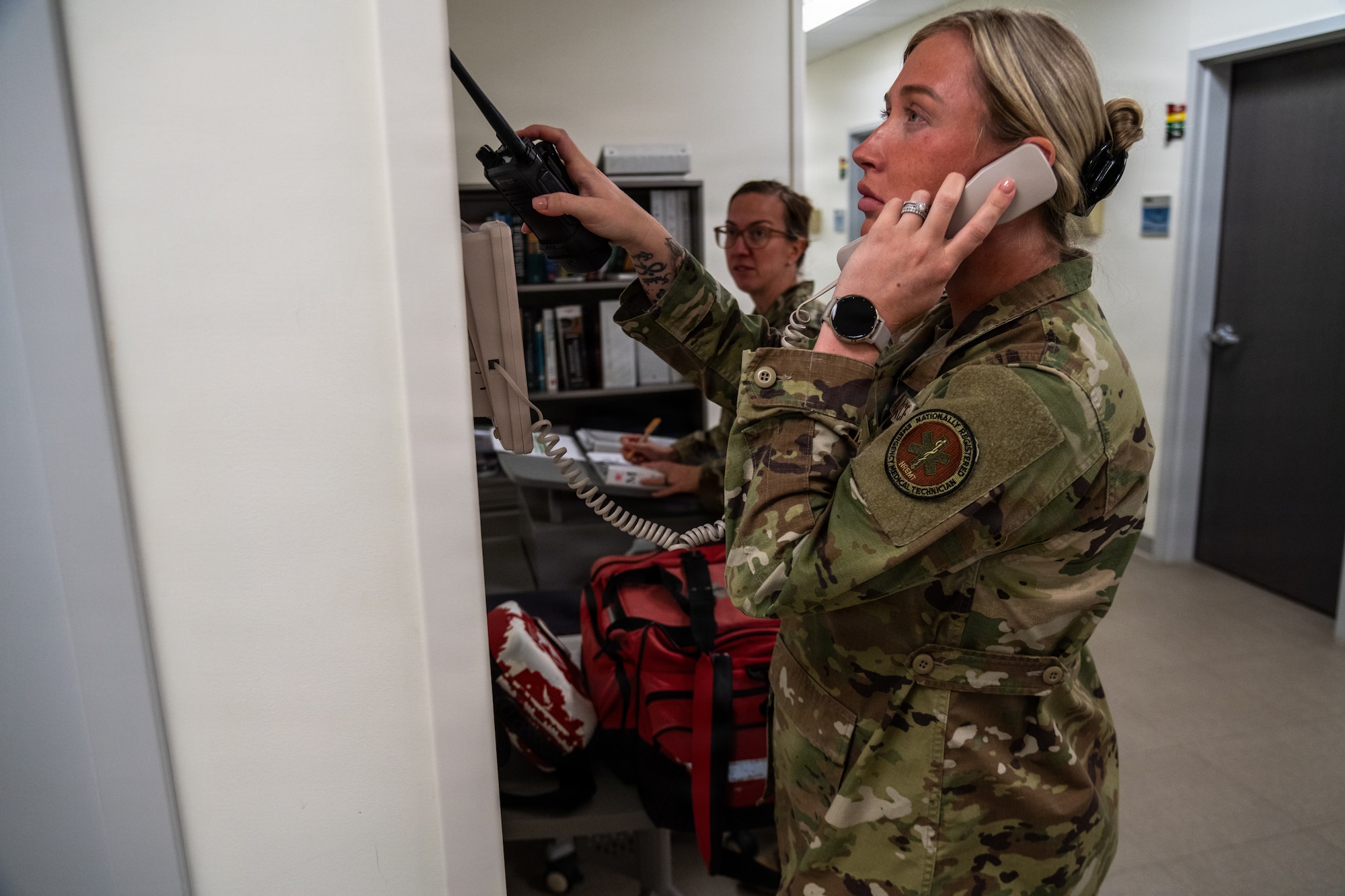 Master Sgt. Sarah Thompson, 4th Medical Group Flight Medicine flight chief, and Staff Sgt. Anicia Roberson, 4th Medical Group medical technician, demonstrates the process of in-flight emergencies or ground emergencies response in an ambulance at Seymour Johnson Air Force Base, N.C. Jan. 23, 2026. Flight Medicine personnel at the 4th Medical Group train to respond to flight line emergencies within five minutes of notification for trusted and speedy care. (U.S. Air Force photo by 2nd Lt. Jason Pannell).