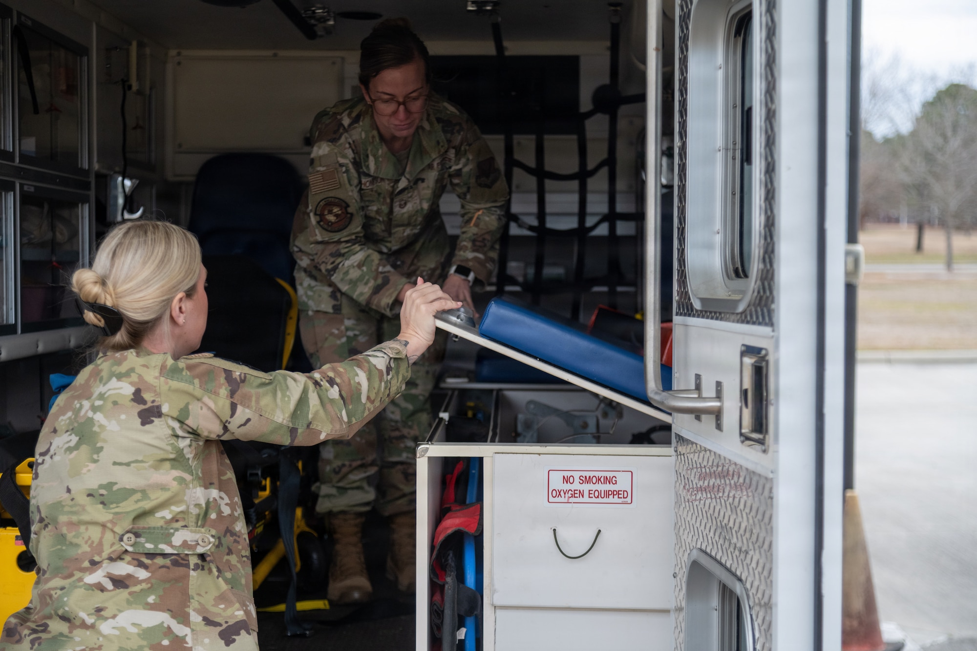 Master Sgt. Sarah Thompson, 4th Medical Group Flight Medicine flight chief, and Staff Sgt. Anicia Roberson, 4th Medical Group medical technician, checks the equipment required to tend to the acute medical needs of in-flight emergency or ground emergency patients outside of the 4th Medical Group at Seymour Johnson Air Force Base, N.C. Jan. 23, 2026. Flight Medicine personnel at the 4th Medical Group train to respond to flight line emergencies within five minutes of notification for trusted and speedy care. (U.S. Air Force photo by 2nd Lt. Jason Pannell).