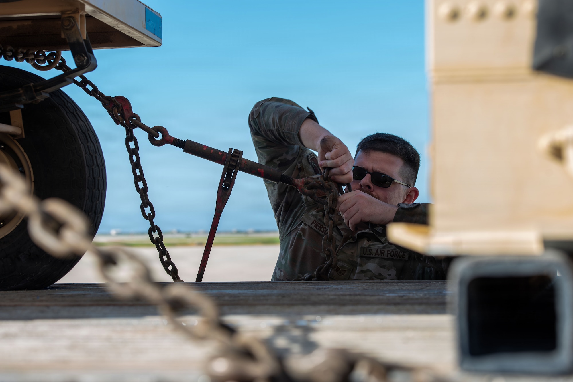 U.S. Air Force Staff Sgt. Gregory Pierson, 25th Aircraft Maintenance Squadron crew chief shift lead, unloads equipment in preparation for exercise Bamboo Eagle 26-1 at Point Mugu Naval Air Station, Calif., Feb. 12, 2026.