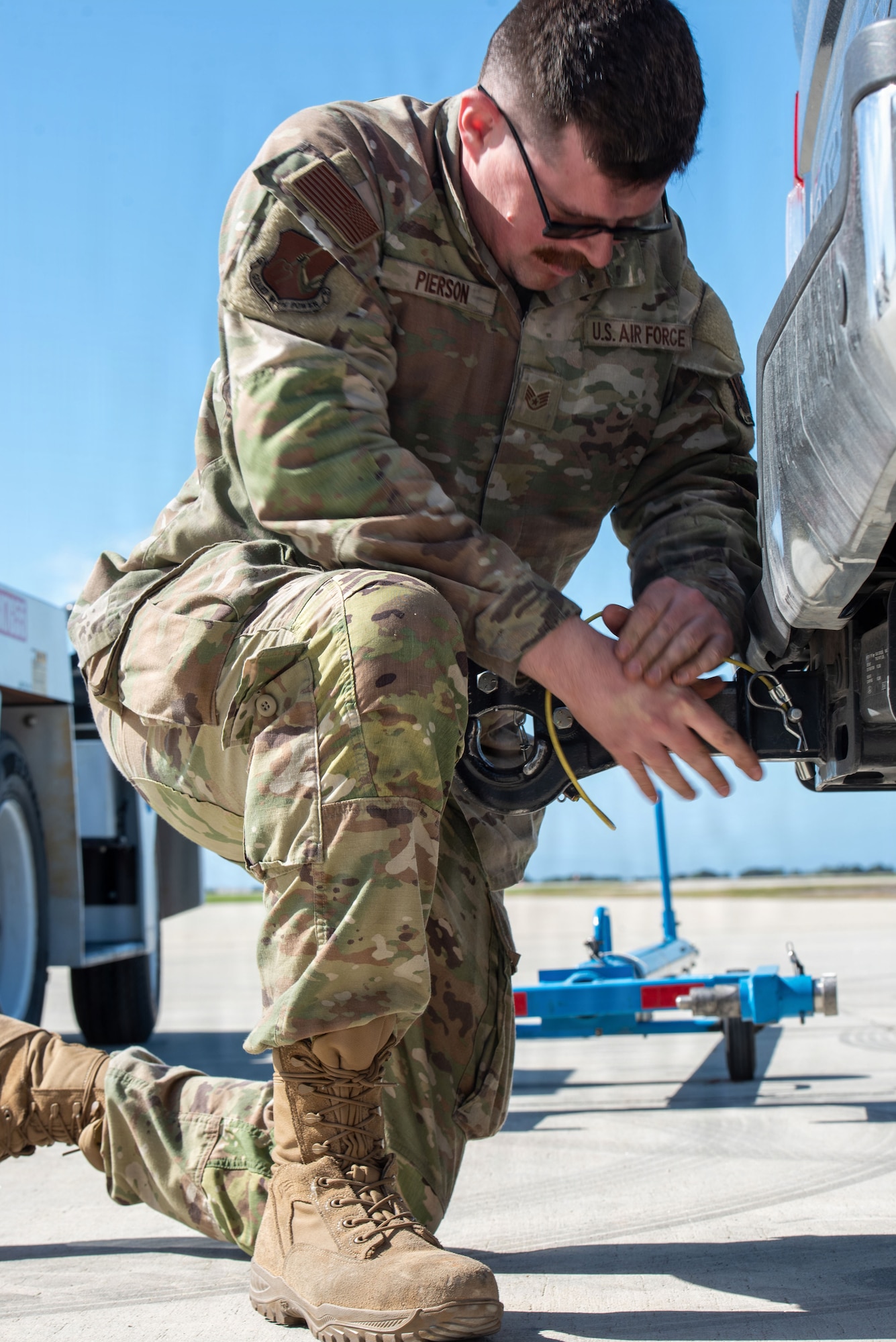 U.S. Air Force Staff Sgt. Gregory Pierson, 25th Aircraft Maintenance Squadron crew chief shift lead, unloads equipment in preparation for exercise Bamboo Eagle 26-1 at Point Mugu Naval Air Station, Calif., Feb. 12, 2026.