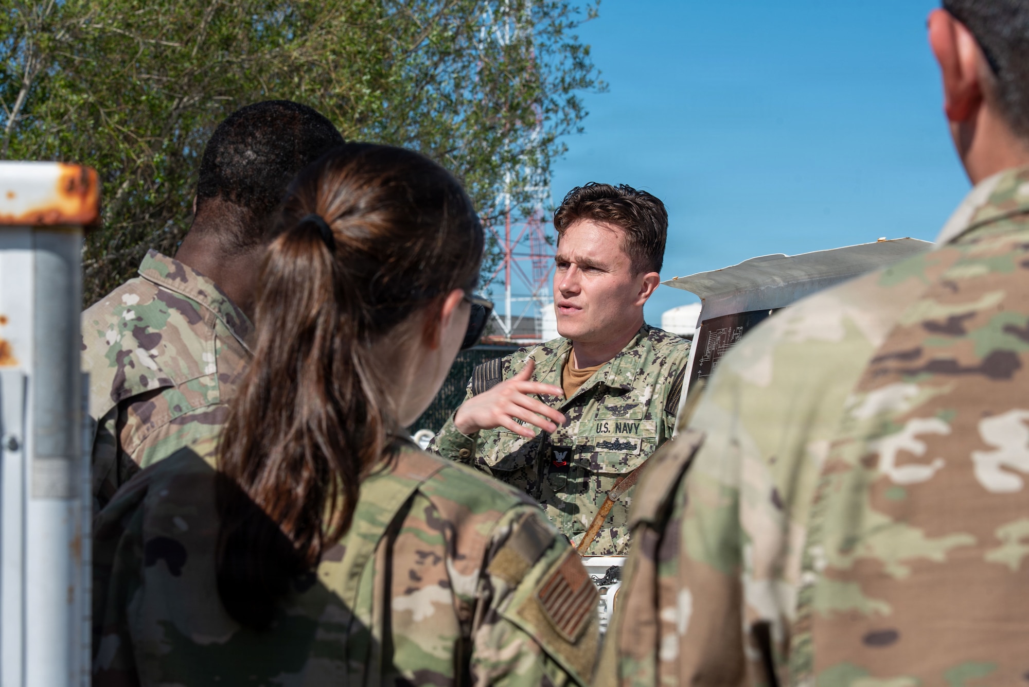 U.S. Navy Petty Officer 2nd Class Sabahudin Covic, 900 Division floor supervisor, trains Airmen assigned to the 25th Aircraft Maintenance Squadron to operate U.S. Navy NC-10C Mobile Electric Power Plants during exercise Bamboo Eagle 26-1 at Point Mugu Naval Air Station, Calif., Feb. 12, 2026.