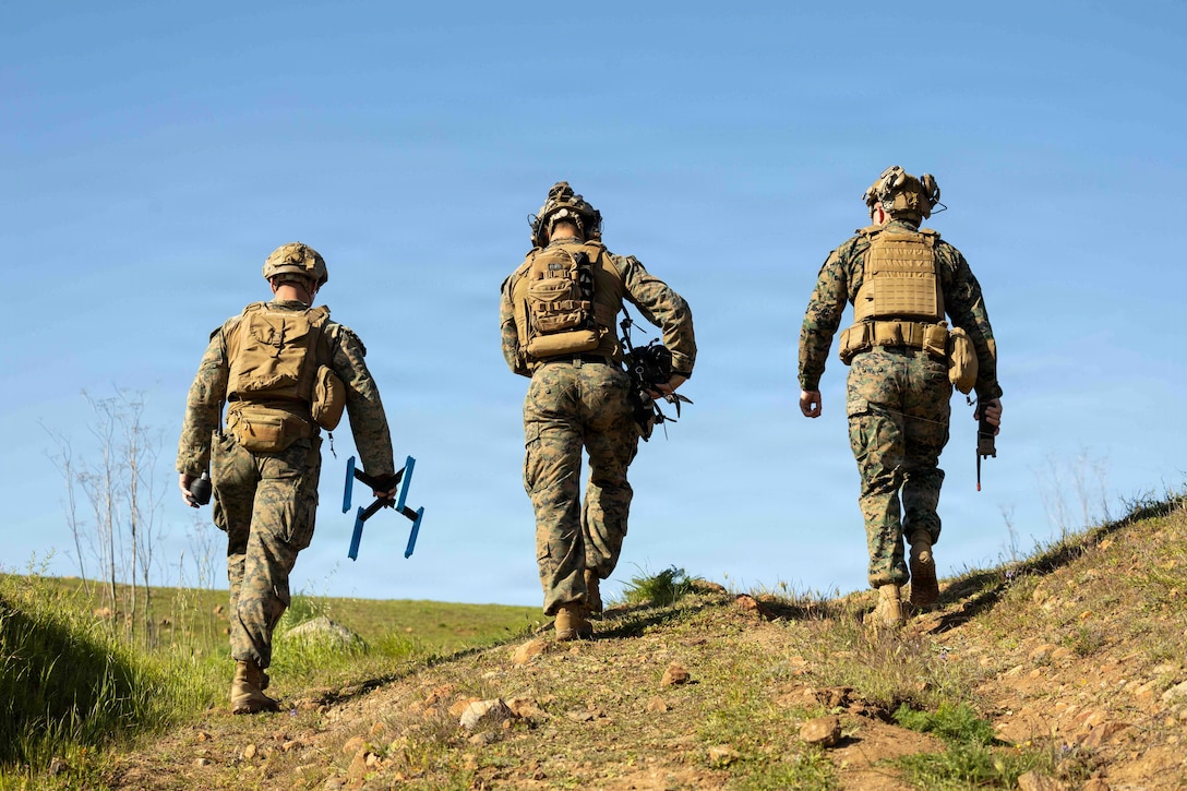 U.S. Marines with I Marine Expeditionary Force, prepare a first-person view small unmanned aircraft system during an FPV sUAS live fire demonstration at Marine Corps Base Camp Pendleton, California, Jan. 29, 2026. I MEF, in partnership with Defense Innovation Unit, evaluated fiber-optic drones for use in signal-degraded environments. (U.S. Marine Corps photo by Cpl. Joshua Bustamante)