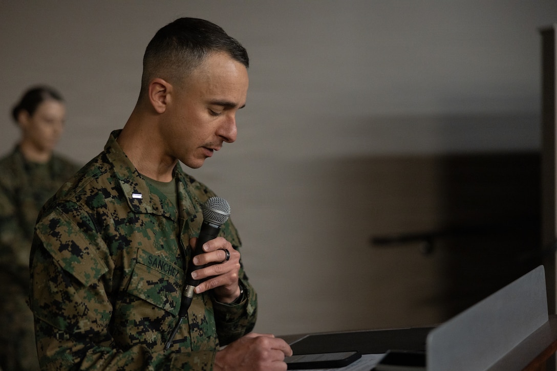 U.S. Navy Lt. j.g. Sanchez, chaplain, Provost Marshal’s Office, Marine Corps Base Camp Pendleton, gives the invocation during a Marine Corps Law Enforcement Program Officer and Civilian Employee Awards Ceremony at MCB Camp Pendleton, Calif., Feb. 17, 2026. The ceremony was held to award the outstanding contributions and commitment of MCLEP officers and recognize civilian employees for their federal length-of-service accomplishments. (U.S. Marine Corps photo by Sgt. Buck)